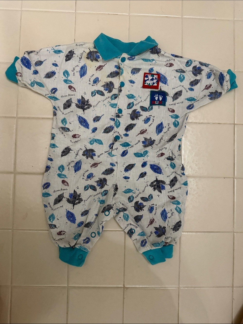 Baby One-Piece Romper in Teal and White Leaf Print. UC  has few stains